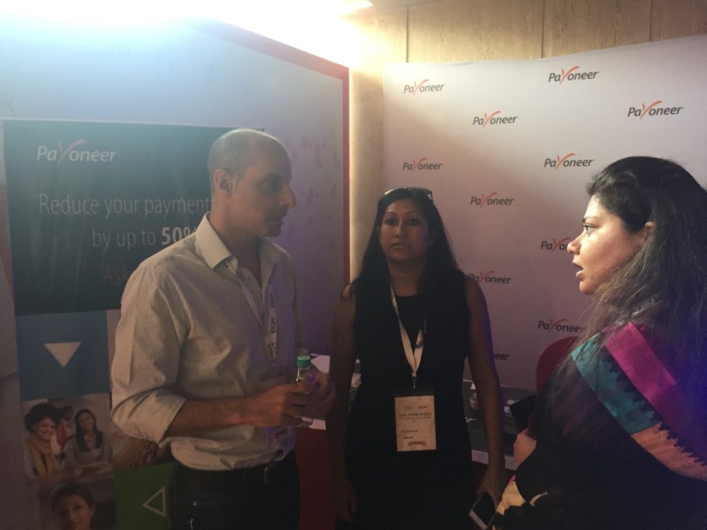 India Affiliate Summit 2015 Delhi Payoneer team discussing